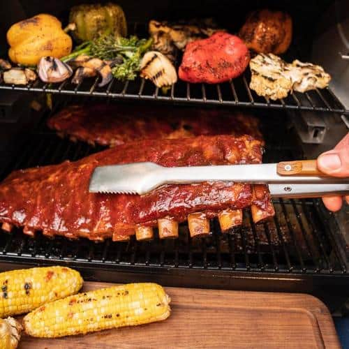 Traeger-BBQ-Grilling-Tongs-holding-a-rack-of-ribs.jpeg Traeger-BBQ-Grilling-Tongs-holding-a-rack-of-ribs.jpeg